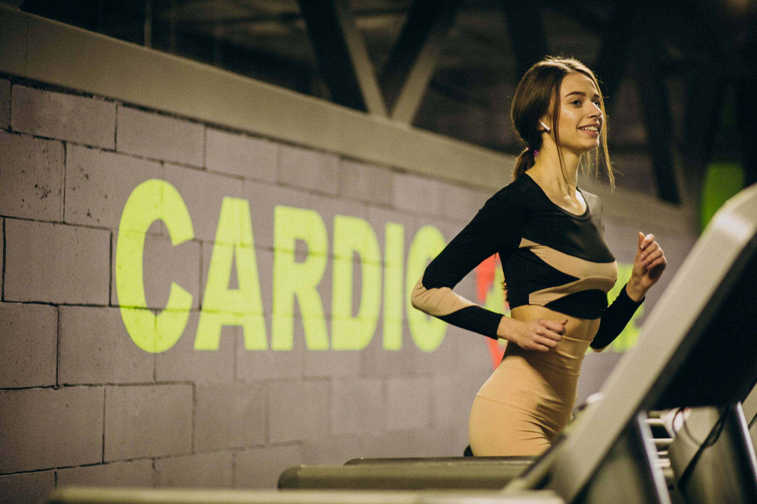 Woman jogging on running track